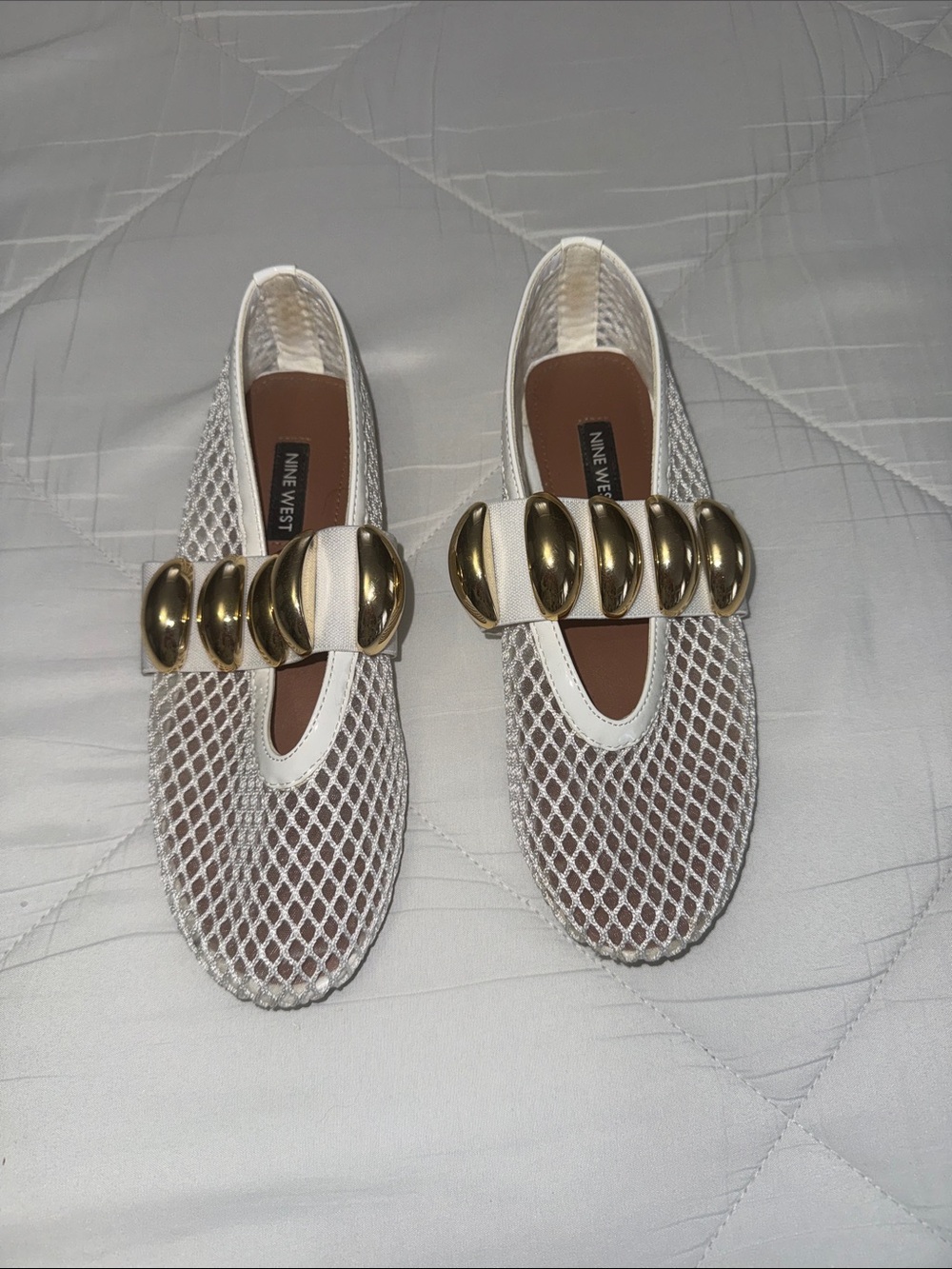 Nine West White Mesh Slip-Ons with Bold Gold Accent